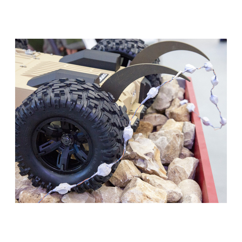 SCORPION A small portable remote-controlled robotic mine exploration and clearing complex